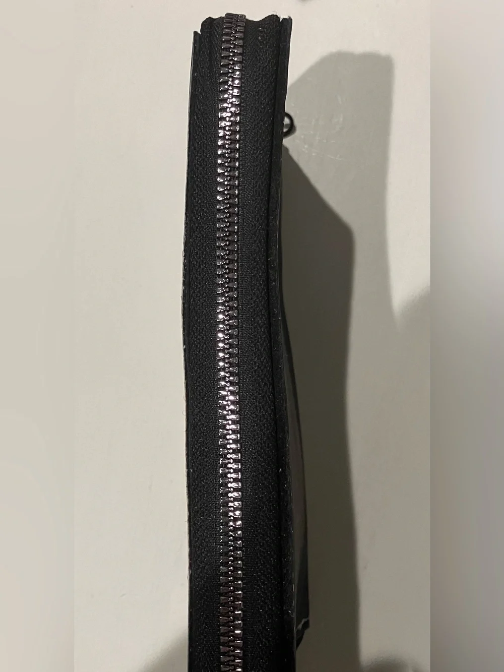 Western-themed zip-around wallet cowboy riding horse sunset
